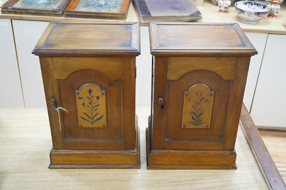 A pair of Victorian Aesthetic period oak table top cabinets, each with five drawers, 38cm high. Condition - fair to good